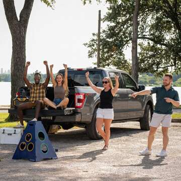 Caliber Games TowerBall Bundle - Backyard, Lawn, Beach & Tailgate Game - Great for All Ages & Group Sizes - Includes Collapsible Tower, 8 Balls (4 Green and 4 Blue), and a Premium Backpack