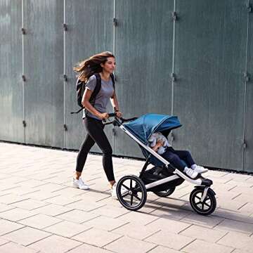 Thule Urban Glide 2 Jogging Stroller - Single Baby Stroller for Daily Strolling and Jogging - Features 5-Point Harness, Lightweight and Compact, Durable and Versatile Design for All Terrains, Blue