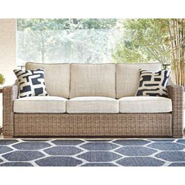 Signature Design by Ashley Beachcroft Outdoor Wicker Patio Sofa with Cushion and 2 Pillows, Beige