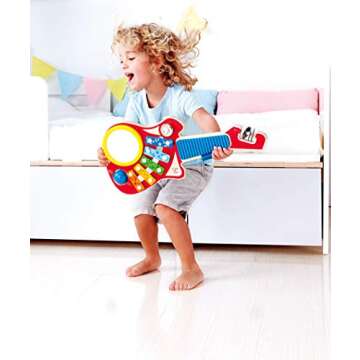 Hape 6-in-1 Music Maker | Colorful 6 Instrument Guitar Shaped Musical Toy for Ages 18 Months+