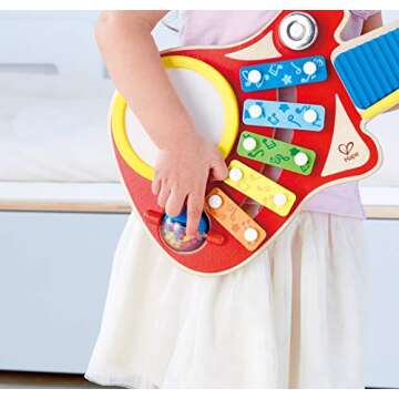 Hape 6-in-1 Music Maker | Colorful 6 Instrument Guitar Shaped Musical Toy for Ages 18 Months+