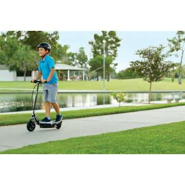 Razor E100 Glow Electric Scooter for Kids Age 8 and Up, LED Light-Up Deck, 8" Air-Filled Front Tire, Up to 40 min Continuous Ride Time