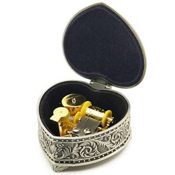 Falado Wingostore Emboss Alloy Metal Music Box Wind Up and Golden Movement Music Box for Christmas/Birthday/Valentine's Day (HearShapedMetalYMSS, You are My Sunshine)