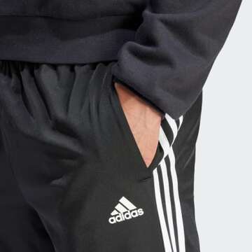 adidas mens Essentials Warm-Up Tapered 3-Stripes Track Pants, Black/White, Medium US