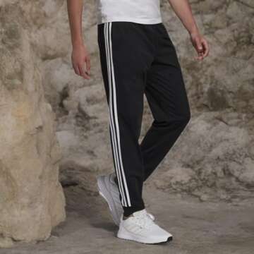 adidas mens Essentials Warm-Up Tapered 3-Stripes Track Pants, Black/White, Medium US