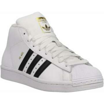 adidas Originals unisex-child Pro Model Sneaker , White/Black/Gold Foil , 4.5 Big Kid