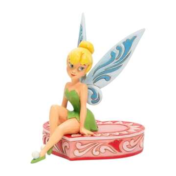 Enesco Disney Traditions by Jim Shore Peter Pan Tinker Bell Sitting on Heart Figurine, 5 Inch, Multicolor