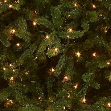 National Tree Company Pre-lit 'Feel Real' Artificial Giant Downswept Christmas Tree, Green, Douglas Fir, White Lights, Includes Stand, 10 feet