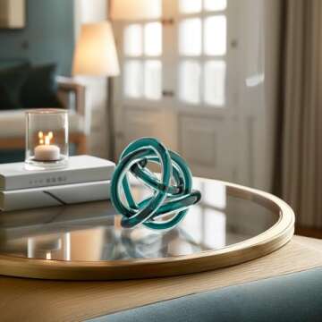 Torre & Tagus Orbit Hand Blown Glass Infinity Knot Sculpture - 3 Inch Glass Art Teal Knot Decor Ball for Home Decor, Small Centerpiece Table Decoration for Home Interior (Clear Teal)